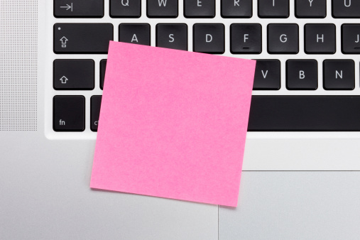 Adhesive Note on computer keyboard