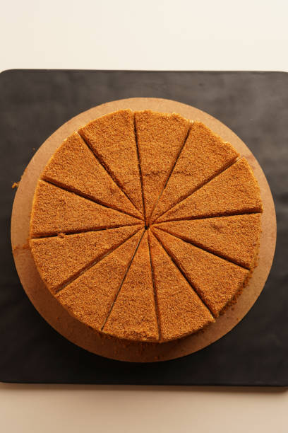 istock Honey cake dessert piece. Layered cake 1702351403