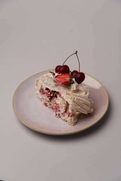 istock Meringue Pavlova cake with fresh strawberry 1702357049