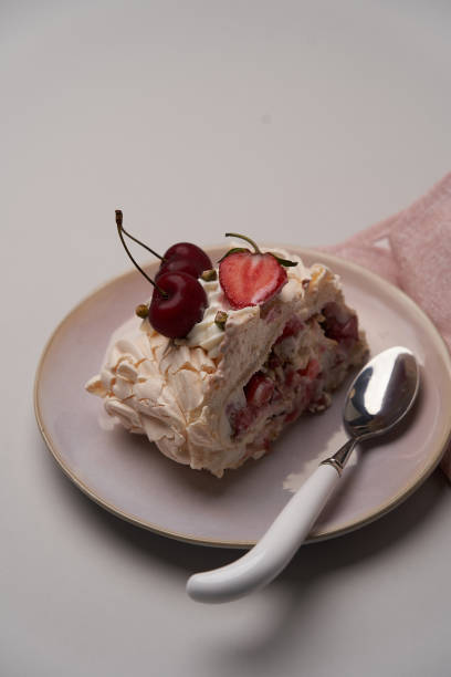 istock Meringue Pavlova cake with fresh strawberry 1702357057