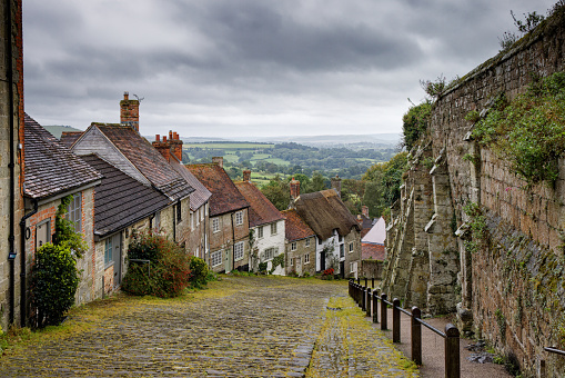 Looking down the iconic view of Gold Hill in Shaftesbury Dorset England UK
