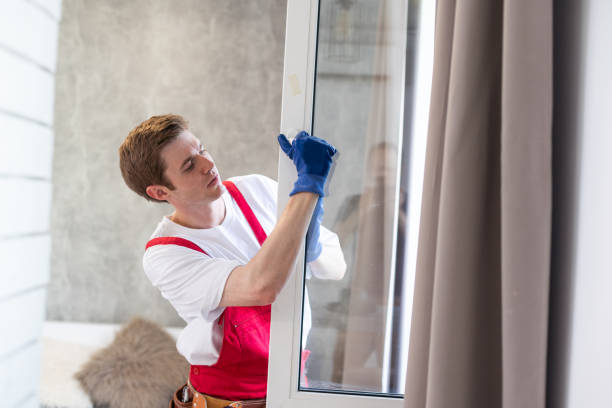 istock A repairman fixing windows in new apartment 1702365717