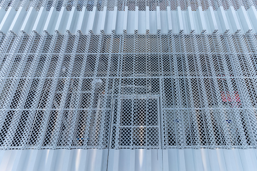 The exterior wall decorated with steel bars in modern architecture