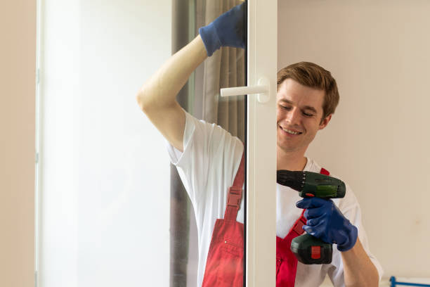 istock A repairman fixing windows in new apartment. 1702376805