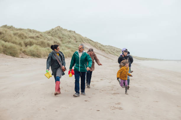 istock A Beachside Family Stroll 1702391169
