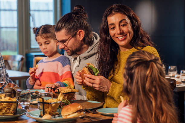 istock Restaurant with Family 1702391709