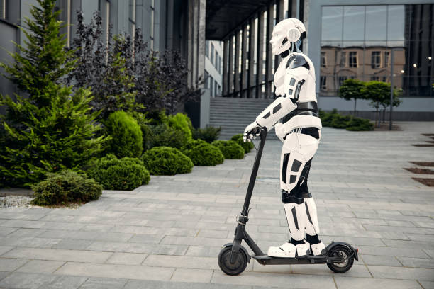 istock Robot rides a scooter on the street 1702396799