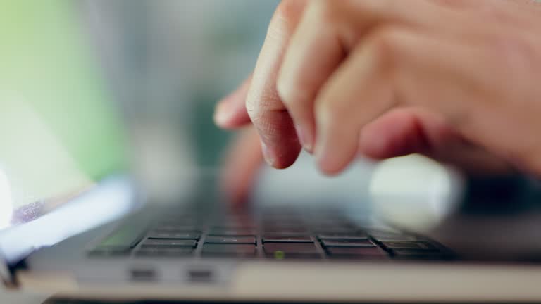 Hands typing, laptop and closeup in office, research and internet blog. Computer, keyboard and professional online, writing email and click to press for networking on digital website of consultant