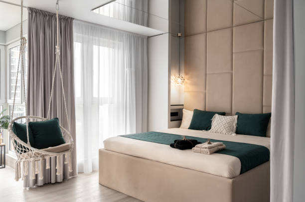 istock Bedroom in Bali style with window to the bathroom 1702435251