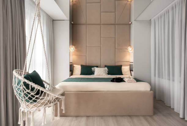 istock Bedroom in Bali style with window to the bathroom 1702436878
