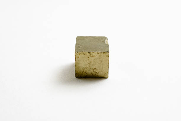 istock Cube of mineral pyrite 1702446485