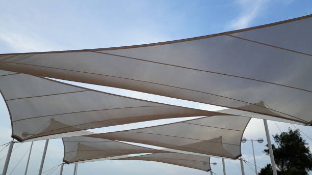 istock Fabrics to cover the sun and make shadows, with triangular shapes 1702447086