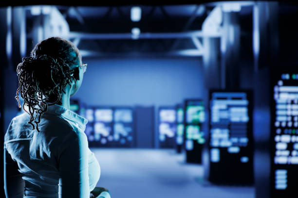 istock Woman in server room prevents downtime 1702448299