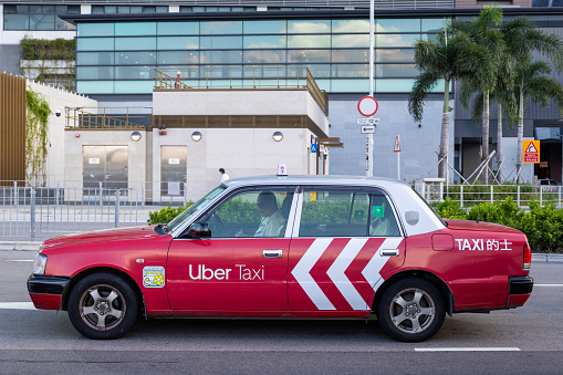 Hong Kong - September 26, 2023 : Uber Taxi is seen in Wan Chai, Hong Kong.