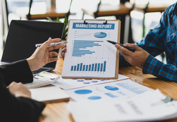istock Businessman cooperation discussing working analyzing with financial data and marketing growth report graph in team, presentation and brainstorming to strategy planning making profit of company. 1702463685