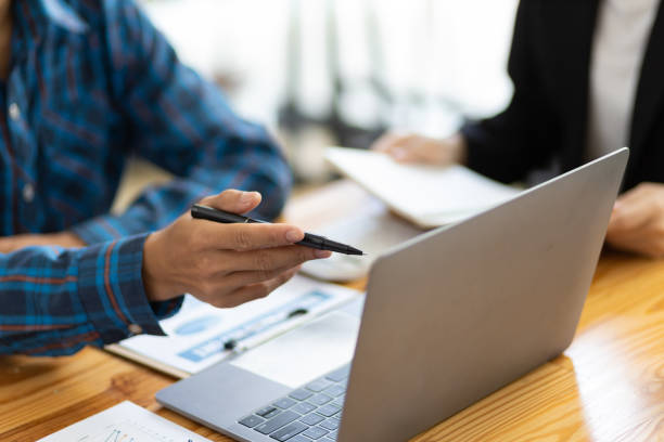 istock Businessman cooperation discussing working analyzing with financial data and marketing growth report graph in team, presentation and brainstorming to strategy planning making profit of company. 1702463729