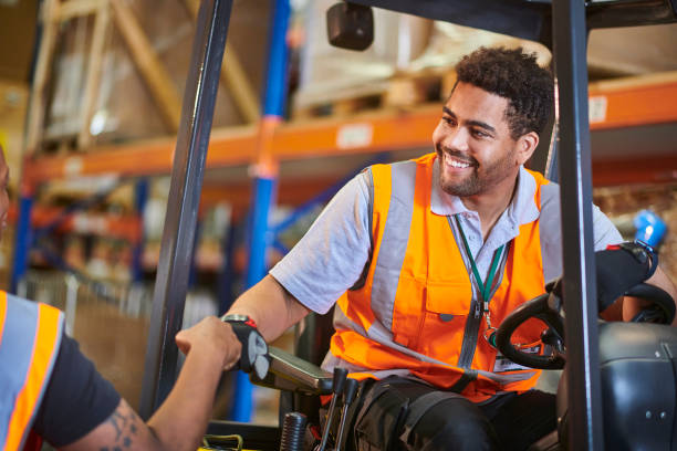 fork lift truck driver in the warehouse