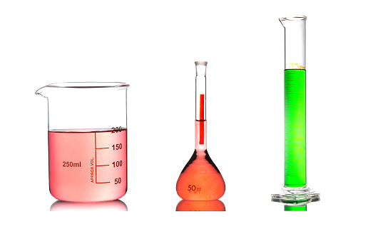 A set of chemical glassware filled by liquid in laboratory