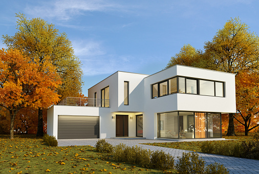 3d rendering of a modern white cubic villa in autumn