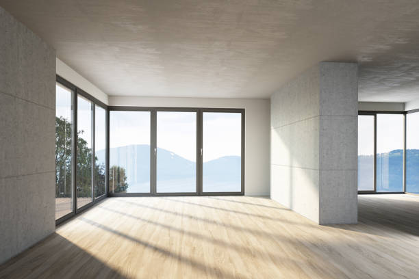 istock Empty apartment with concrete walls and a panoramic view 1702493246