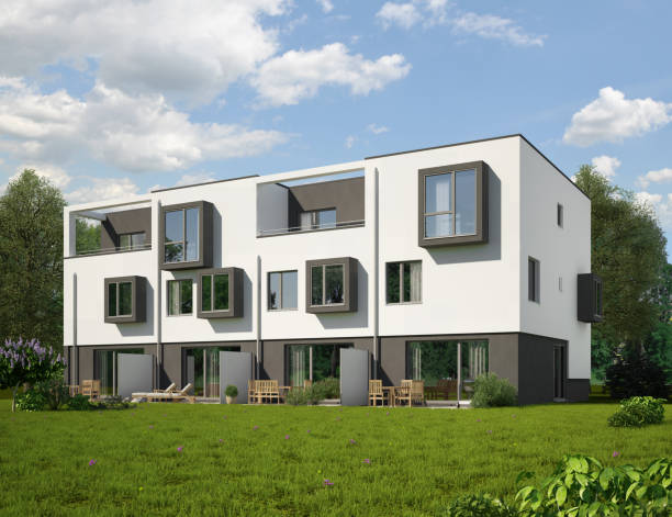 istock Modern town houses with gray wall elements 1702493256