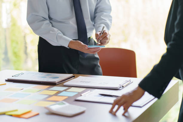 istock Business People brainstorming Meeting Design Ideas use post it notes to share idea professional investor start up project business brainstorming planning in office 1702507638
