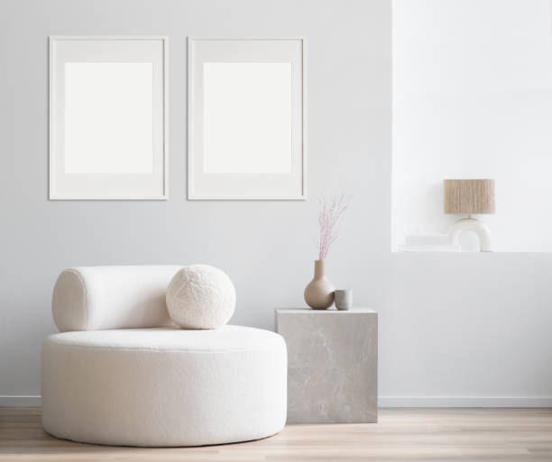 istock Two blank picture frames on a wall. Artwork mockups in interior design. Vertical orientation. 1702561304