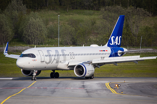 Tromsö, Norway - June 14, 2023: SAS Scandinavian Airlines Airbus A320 arriving in Tromsö after flight from Stockholm