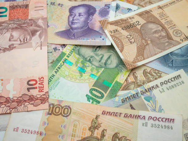 istock stacked banknotes of the brics countries 1702584555