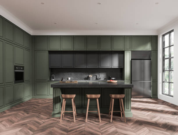 istock Stylish kitchen interior with bar island and cooking space with window 1702587930