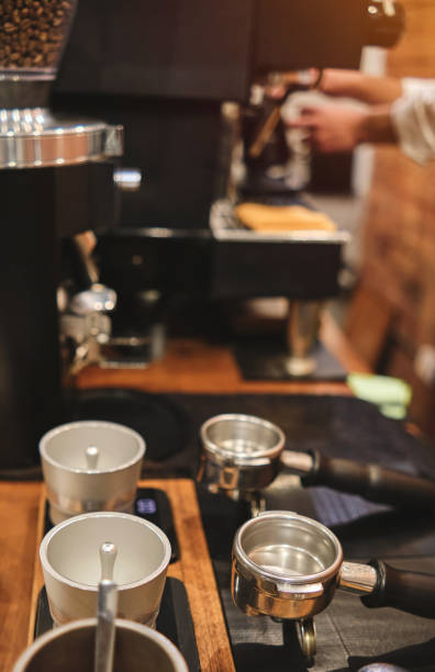 istock Close up barista hand making a cup of coffee. 1702599649
