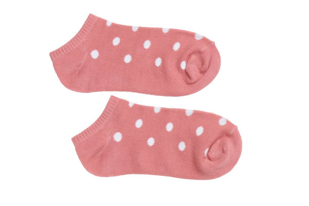 istock Pink polka dot ankle socks on white background, isolated 1702605003