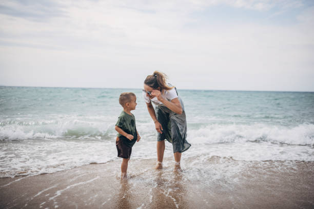 istock Woman with son on vacation 1702630553
