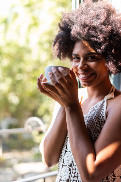 istock Woman enjoying a coffee in the morning 1702631696