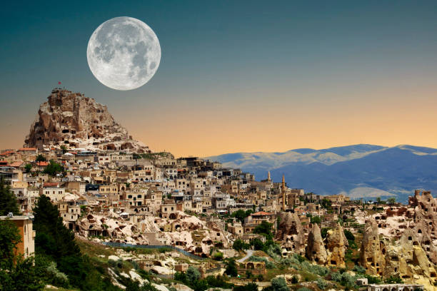 istock Cappadocia Uhisar Castle is a magnificent view at moon. Nevsehir,Turkey 1702641355