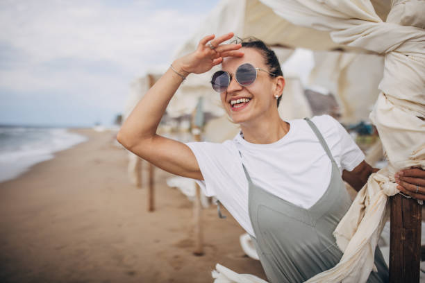 istock Happy woman on vacation 1702652462