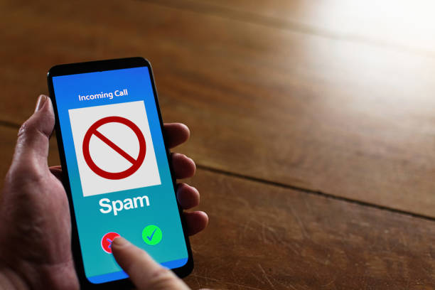 istock Man rejects a spam call on his mobile phone 1702686345