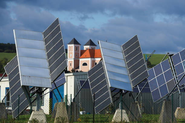 istock Modern adjustable solar panels in contrast with old historical architecture. 1702687991