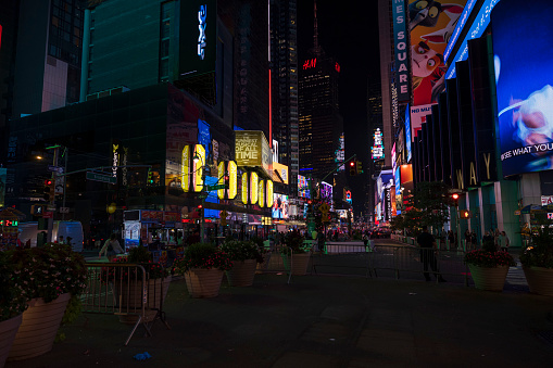NY. USA. 09.25.2023. Beautiful night view of Time Square on Broadway in New York with people walking around.