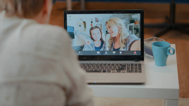 istock Older person talking to family on videoconference call 1702690179
