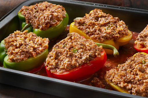 Italian Style Stuffed Peppers with Ground Beef, Rice, Tomato Sauce and Cheese