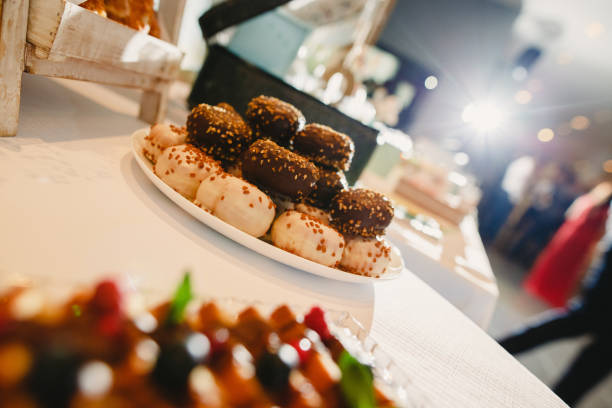 istock Elegant candy bar for a wedding full of pastries 1702736884
