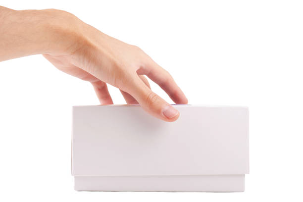 istock Man, hand opening a simple blank empty white box packaging for smartphone mobile phone, side view, unbranded generic box product unboxing concept, object isolated on white background, cut out, nobody 1702740176