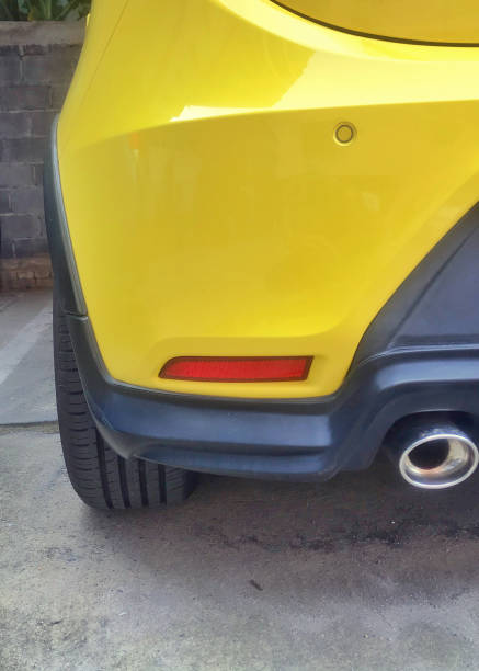 Closeup of rear, back side of yellow car. - fotografia de stock