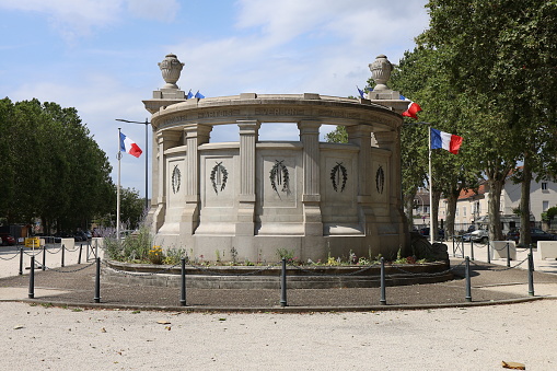 Valenciennes, France - June 22 2020: Monument to the dead of the 1914-1918 war inaugurated in November 1924. It was created by the architect Henri Armbruster and the sculptor Elie Raset.