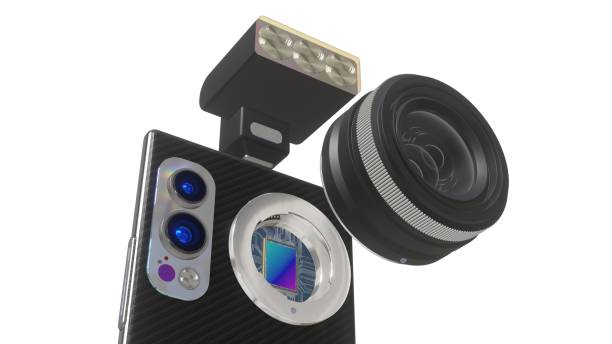 istock Conceptual 3D illustration of smartphone with interchangeable lens and flash, 3D rendering, isolated on white, low point of view 1702776734