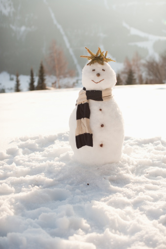 Snowman is standing on his head