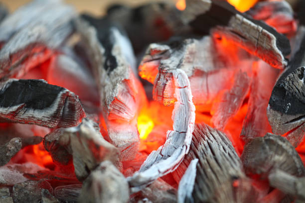 istock preparing for outdoors barbecueing, charcoal in usable condition 1702806606