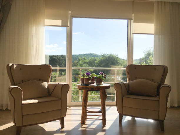 istock living room with beauitiful sunrise and mountain backdrop 1702821438