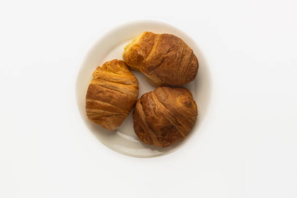 istock Croissant- bread in the foreground 1702825259